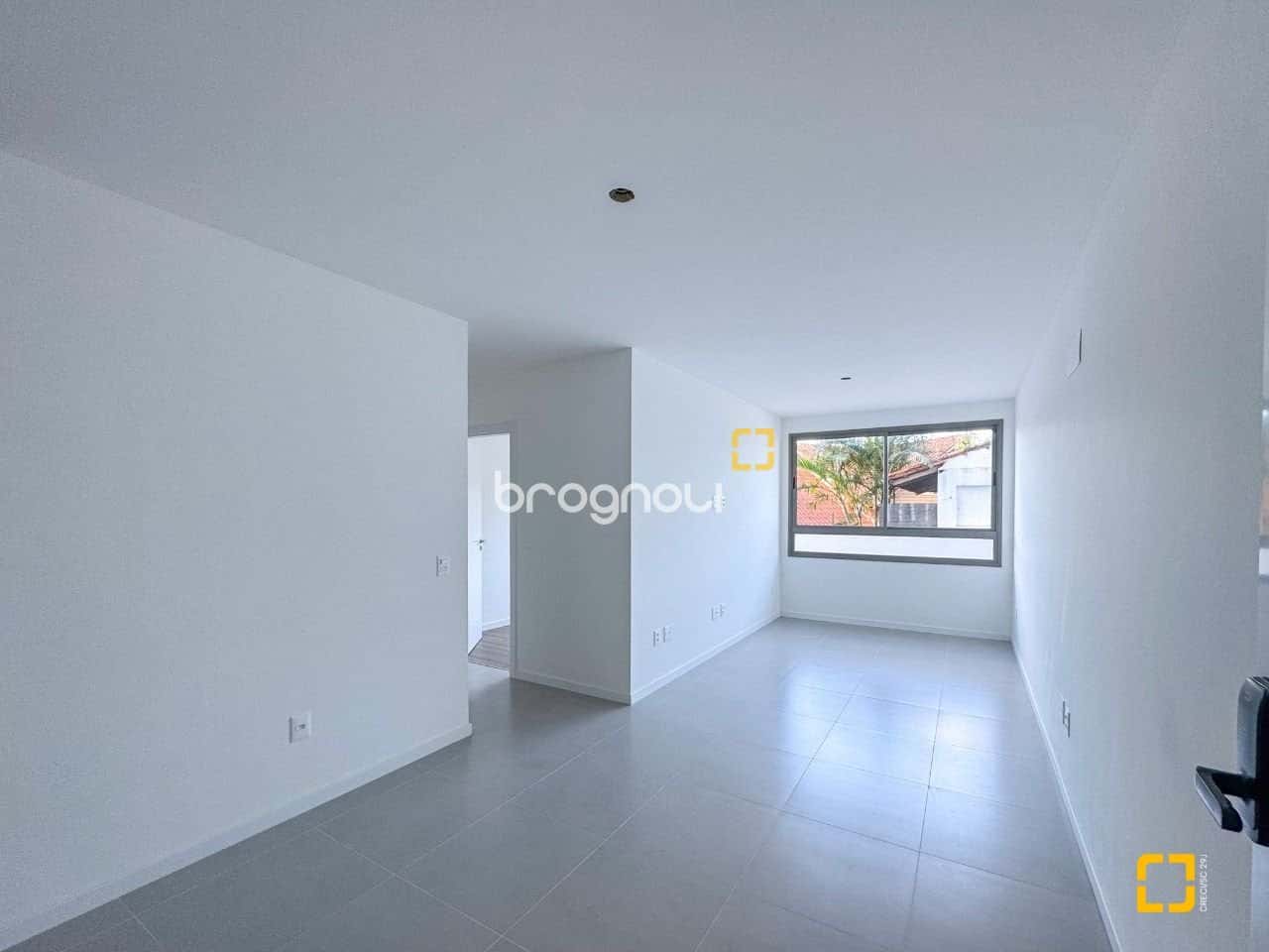 Apartamento 2 dormitórios, sendo 1 suíte - 1 vaga - 1 Hobby box - Cacupé Florianópolis SC — foto principal