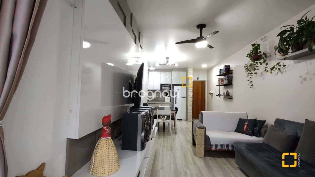 Apartamento à venda com 3 dormitórios, suíte, sacada com churrasqueira, 2 vagas individuais, elevador - bairro Capoeiras - Florianópolis — foto principal