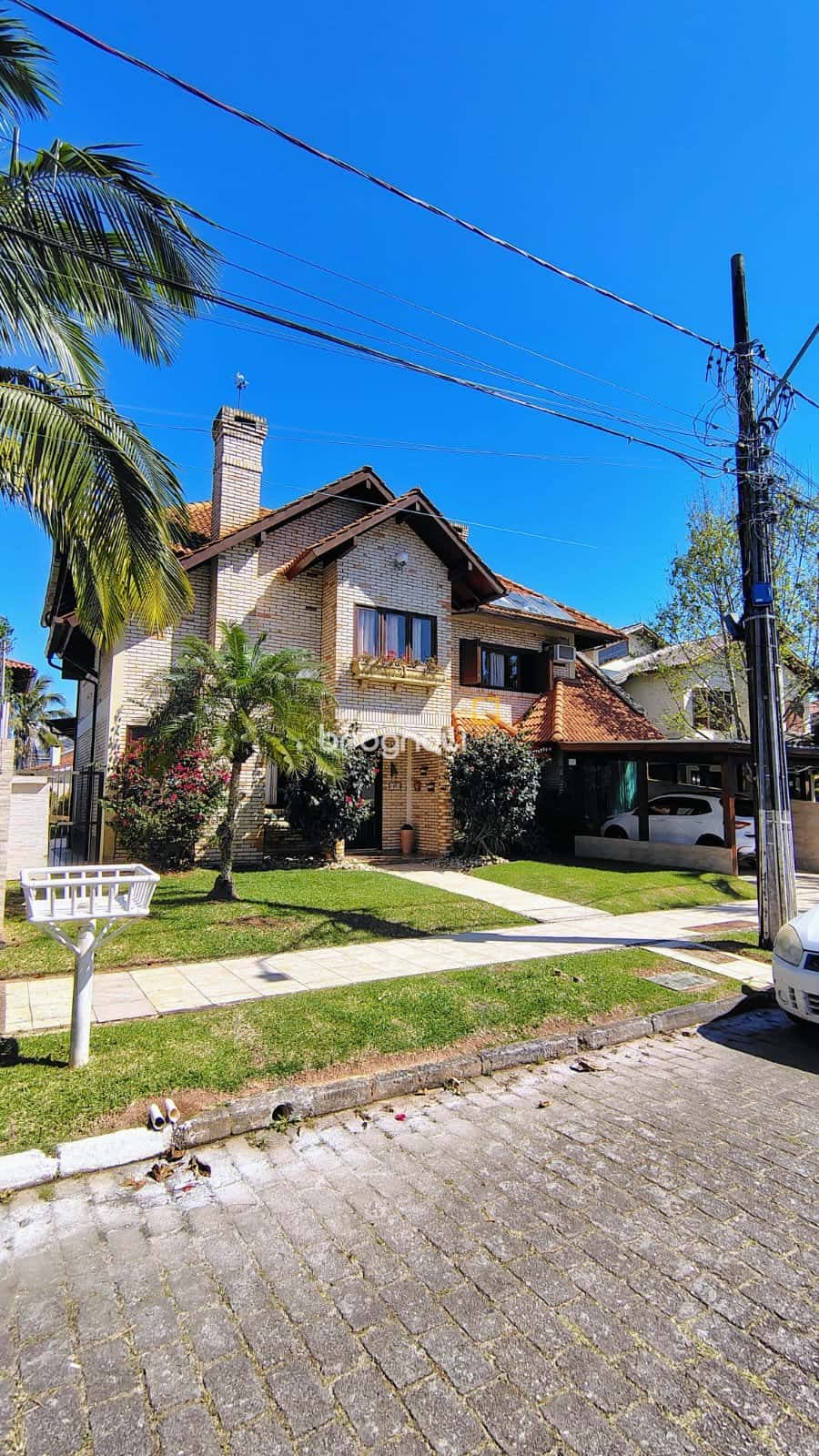 Casa com 4 suítes, piscina e espaço gourmet à venda, 300m² privativos Jurerê Internacional — foto principal