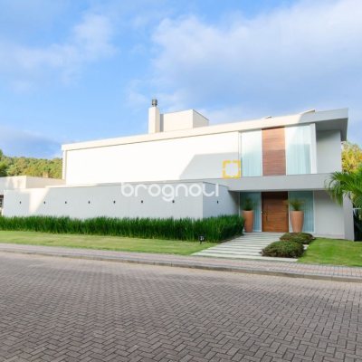 Casa de Condomínio com 942m², 6 quartos (sendo 5 suítes), 4 garagens, no bairro Cacupé em Florianópolis