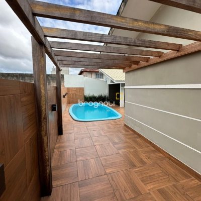 Casa com 210m², 3 quartos (sendo 1 suíte), 2 garagens, no bairro Aririú em Palhoça