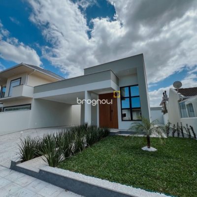 Casa de Condomínio com 137m², 3 quartos (sendo 1 suíte), 2 garagens, no bairro Praia de Fora em Palhoça