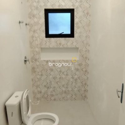 Casa de Condomínio com 137m², 3 quartos (sendo 1 suíte), 2 garagens, no bairro Praia de Fora em Palhoça