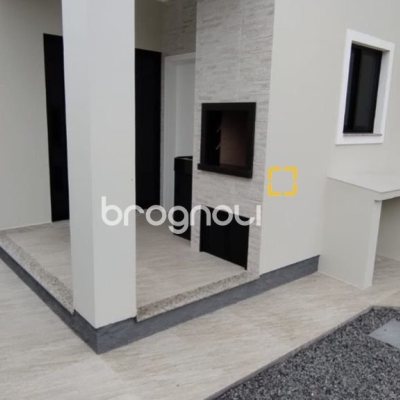 Casa de Condomínio com 137m², 3 quartos (sendo 1 suíte), 2 garagens, no bairro Praia de Fora em Palhoça