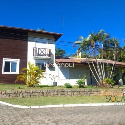 Casa de Condomínio com 542m², 6 quartos (sendo 3 suítes), 4 garagens, no bairro Cacupé em Florianópolis
