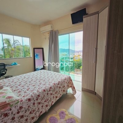 Casa com 291m², 4 quartos (sendo 4 suítes), 3 garagens, no bairro Trindade em Florianópolis