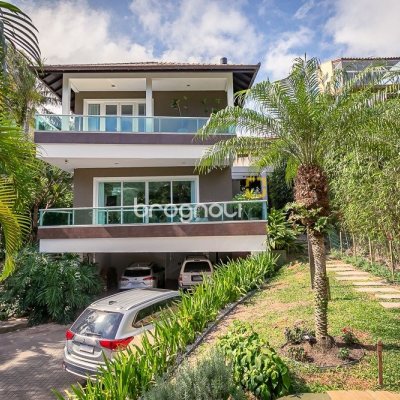 Casa com 410m², 4 quartos (sendo 4 suítes), 3 garagens, no bairro Praia Mole em Florianópolis