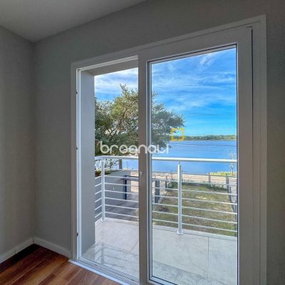 Casa com 157m², 3 quartos (sendo 1 suíte), 2 garagens, no bairro Rio Tavares Central em Florianópolis