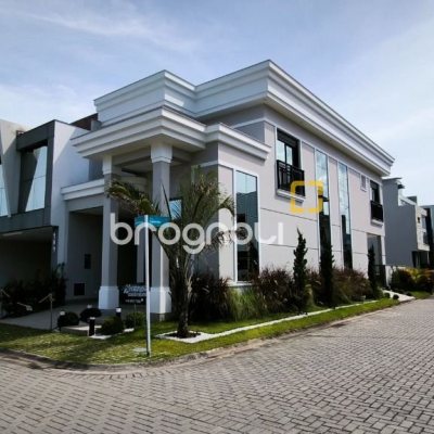 Casa de Condomínio com 165m², 3 quartos (sendo 1 suíte), 2 garagens, no bairro Beira Rio em Biguaçu