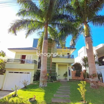 Casa de Condomínio com 277m², 3 quartos (sendo 2 suítes), 3 garagens, no bairro Cachoeira do Bom Jesus em Florianópolis