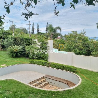 Casa de Condomínio com 392m², 4 quartos (sendo 4 suítes), 5 garagens, no bairro Cacupé em Florianópolis