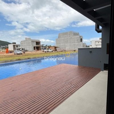 Casa de Condomínio com 216m², 3 quartos (sendo 1 suíte), 2 garagens, no bairro Beira Rio em Biguaçu