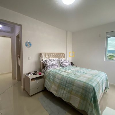 Apartamento com 75m², 2 quartos (sendo 1 suíte), 1 garagem, no bairro Centro em Palhoça