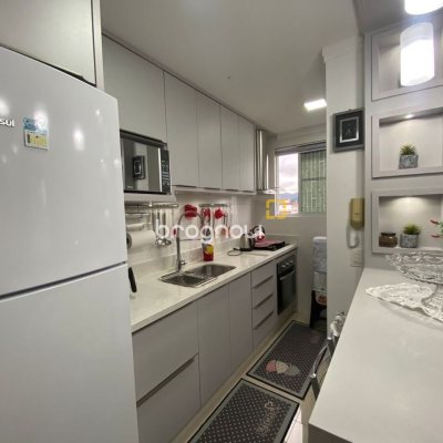 Apartamento com 75m², 2 quartos (sendo 1 suíte), 1 garagem, no bairro Centro em Palhoça