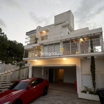 Casa de Condomínio com 1100m², 5 quartos (sendo 5 suítes), 3 garagens, no bairro Roçado em São José
