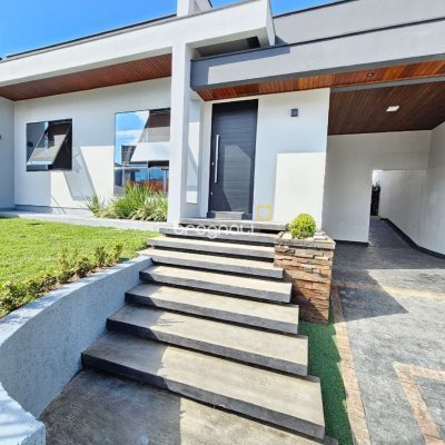 Casa com 160m², 3 quartos (sendo 1 suíte), 2 garagens, no bairro Barreiros em São José