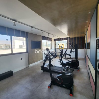 Apartamento com 60m², 1 quarto (sendo 1 suíte), 1 garagem, no bairro Carvoeira em Florianópolis