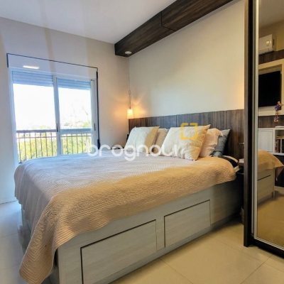 Apartamento com 94m², 2 quartos (sendo 2 suítes), 2 garagens, no bairro Coqueiros em Florianópolis