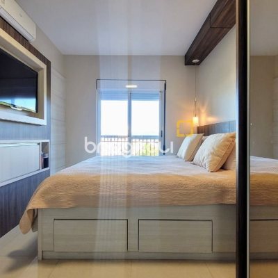 Apartamento com 94m², 2 quartos (sendo 2 suítes), 2 garagens, no bairro Coqueiros em Florianópolis