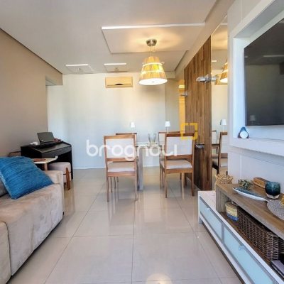 Apartamento com 94m², 2 quartos (sendo 2 suítes), 2 garagens, no bairro Coqueiros em Florianópolis