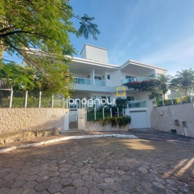 Casa com 475m², 7 quartos (sendo 7 suítes), 8 garagens, no bairro Canasvieiras em Florianópolis
