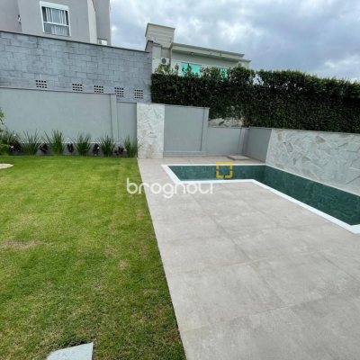 Casa de Condomínio com 339m², 4 quartos (sendo 4 suítes), 4 garagens, no bairro Pedra Branca em Palhoça