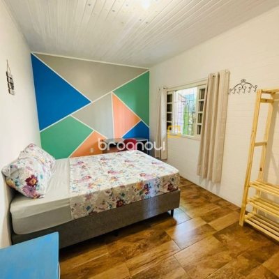Casa com 200m², 7 quartos (sendo 2 suítes), 2 garagens, no bairro Carvoeira em Florianópolis