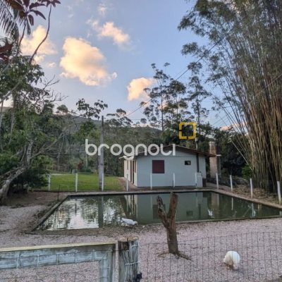 Sítio com 250m², 5 quartos (sendo 1 suíte), 4 garagens, no bairro Campo Duna em Garopaba