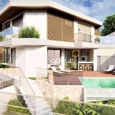 Casa com 302m², 4 quartos (sendo 4 suítes), 3 garagens, no bairro Cacupe em Florianópolis