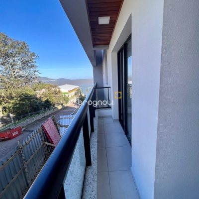 Apartamento com 62m², 2 quartos (sendo 1 suíte), 1 garagem, no bairro Coqueiros em Florianópolis