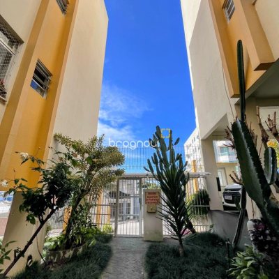 Apartamento com 57m², 2 quartos, 1 garagem, no bairro Coqueiros em Florianópolis