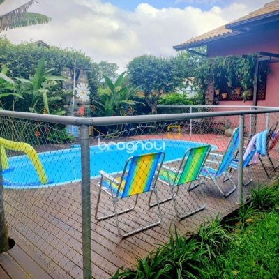 Casa com 288m², 5 quartos (sendo 1 suíte), 2 garagens, no bairro Campeche em Florianópolis