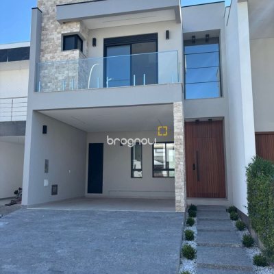 Casa de Condomínio com 176m², 3 quartos (sendo 1 suíte), 4 garagens, no bairro Beira Rio em Biguaçu