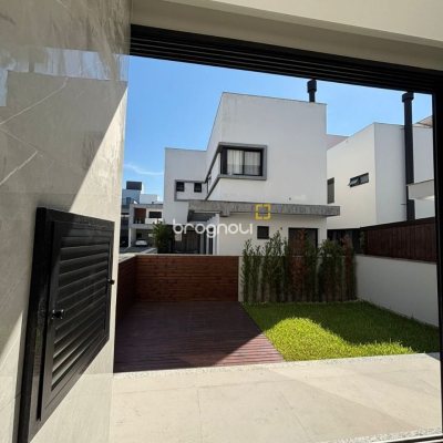 Casa de Condomínio com 176m², 3 quartos (sendo 1 suíte), 4 garagens, no bairro Beira Rio em Biguaçu