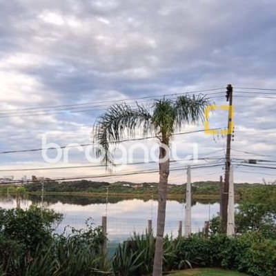 Casa com 310m², 4 quartos (sendo 1 suíte), 4 garagens, no bairro Campeche em Florianópolis