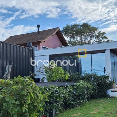 Casa com 310m², 4 quartos (sendo 1 suíte), 4 garagens, no bairro Campeche em Florianópolis