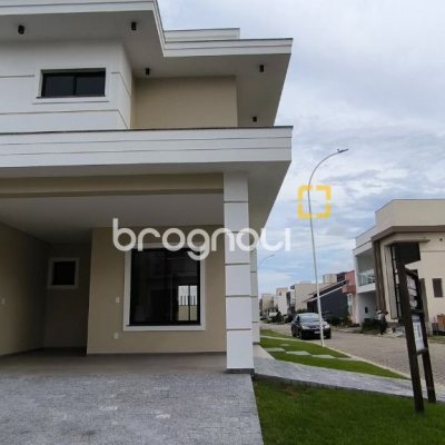 Casa de Condomínio com 150m², 3 quartos (sendo 1 suíte), 2 garagens, no bairro Beira Rio em Biguaçu