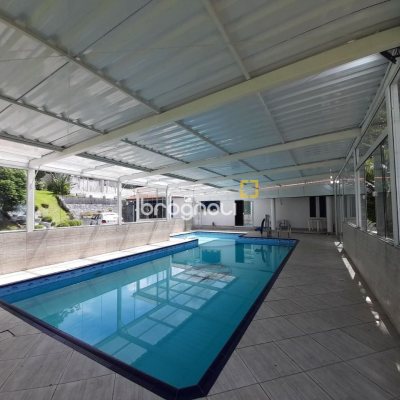 Casa com 340m², 4 garagens, no bairro Jardim Janaina em Biguaçu