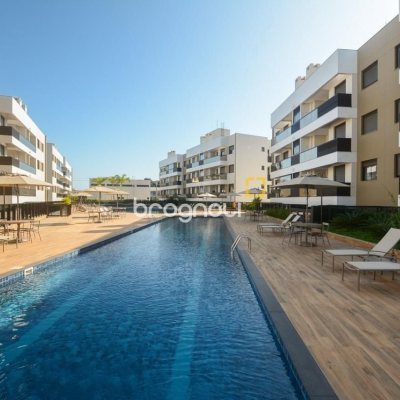 Apartamento com 71m², 2 quartos (sendo 1 suíte), 1 garagem, no bairro Cachoeira do Bom Jesus em Florianópolis
