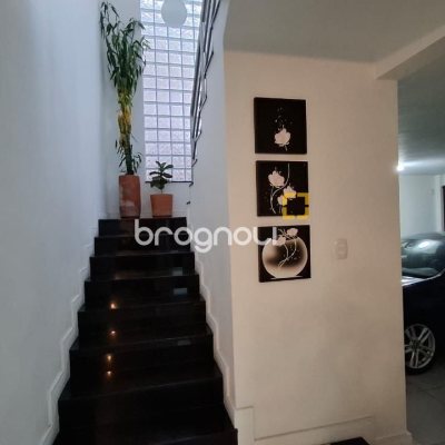 Casa com 200m², 3 quartos (sendo 1 suíte), 2 garagens, no bairro Pedra Branca em Palhoça