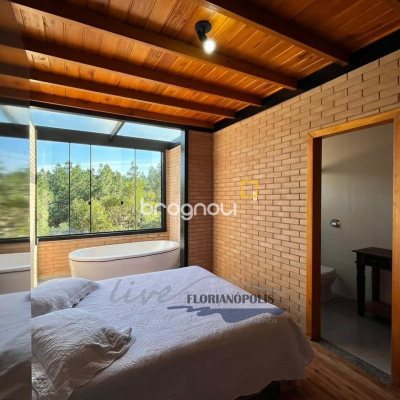 Casa com 200m², 3 quartos (sendo 2 suítes), 3 garagens, no bairro Rancho Queimado em Rancho Queimado
