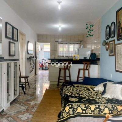 Casa com 218m², 6 quartos (sendo 2 suítes), 2 garagens, no bairro Campeche em Florianópolis