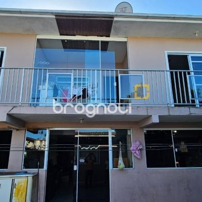 Casa com 241m², 3 quartos (sendo 1 suíte), 3 garagens, no bairro Barreiros em São José