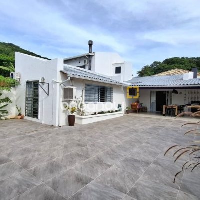 Casa com 412m², 6 quartos (sendo 6 suítes), 4 garagens, no bairro Ponta das Canas em Florianópolis