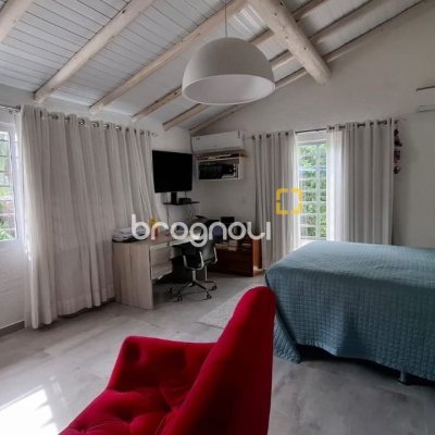 Casa com 412m², 6 quartos (sendo 6 suítes), 4 garagens, no bairro Ponta das Canas em Florianópolis
