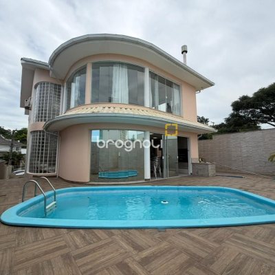 Casa com 292m², 3 quartos (sendo 1 suíte), 3 garagens, no bairro Pedra Branca em Palhoça