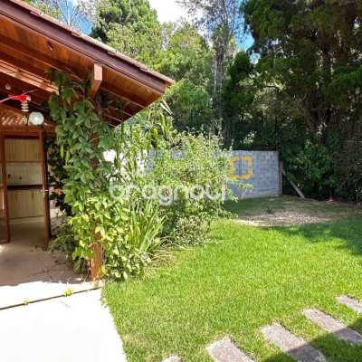 Casa com 340m², 5 quartos (sendo 5 suítes), 2 garagens, no bairro Rio Tavares em Florianópolis