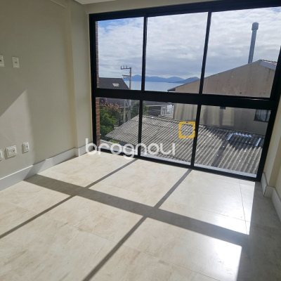 Apartamento com 60m², 2 quartos (sendo 1 suíte), 1 garagem, no bairro Cacupé em Florianópolis