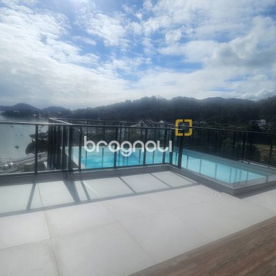 Apartamento com 60m², 2 quartos (sendo 1 suíte), 1 garagem, no bairro Cacupé em Florianópolis