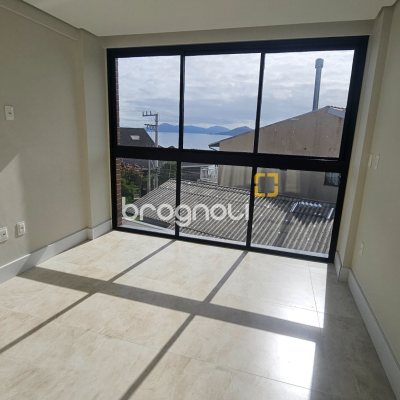 Apartamento com 60m², 2 quartos (sendo 1 suíte), 1 garagem, no bairro Cacupé em Florianópolis